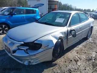 2003 Pontiac Grand Am GT with VIN 1G2NW52E13M612218, listed as a IAAI auction lot 41478495 with NaN miles. Bid and sale history available at carsss.com. Image 18.