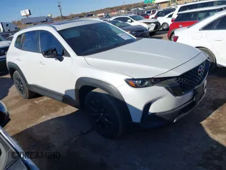 2024 Mazda CX-50 2.5 S Premium Package with VIN 7MMVABDM0RN156681, listed as a IAAI auction lot 40986320 with 21,547 mi miles. Bid and sale history available at carsss.com. Image 1.