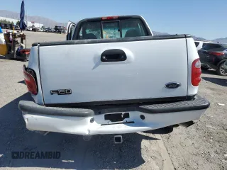 2002 Ford F-150 XL with VIN 1FTRF07L62KD27855, listed as a Copart auction lot 60939935 with Not provided miles and Salvage title. Bid and sale history available at DreamBid. Image 6.