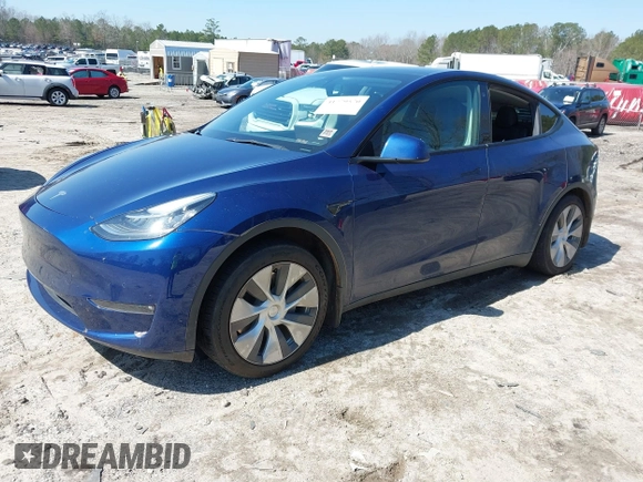 2021 Tesla Model Y Long Range with VIN 5YJYGAEE1MF207948, listed as a IAAI auction lot 41779570 with 100,859 mi miles. Bid and sale history available at carsss.com. Image 2.