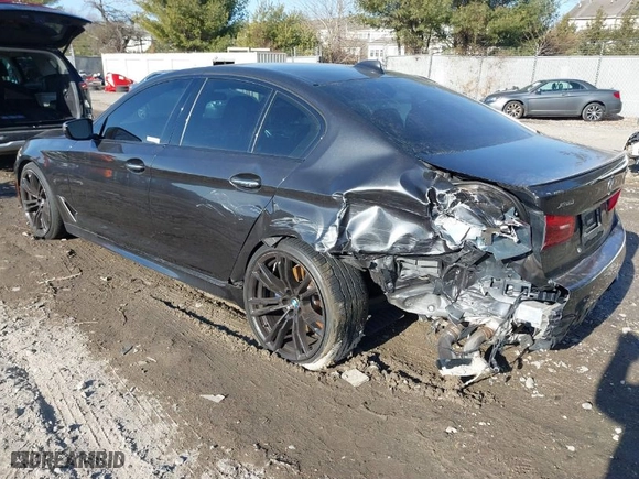 2018 BMW 5 Series M550i xDrive with VIN WBAJB9C55JB287431, listed as a IAAI auction lot 41433436 with 57,790 mi miles. Bid and sale history available at carsss.com. Image 3.