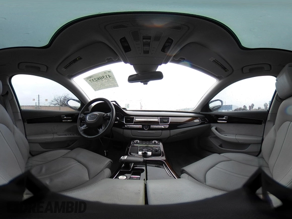 2012 Audi A8 z VIN WAURVAFD5CN008320, wystawiony jako IAAI lot #41508237 z przebiegiem 183 398 mil mil oraz . Historia ofert i sprzedaży dostępna na DreamBid. Obrazek 18.