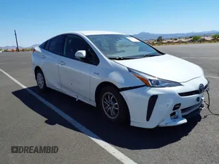 2021 Toyota Prius L Eco with VIN JTDKAMFU9M3133528, listed as a IAAI auction lot 41950856 with 138,787 mi miles. Bid and sale history available at carsss.com. Image 1.