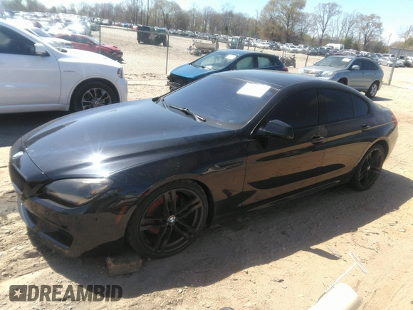 2014 BMW 6 Series 640i z VIN WBA6A0C57EDZ04682, wystawiony jako IAAI lot #41891362 z przebiegiem 140 478 mil mil oraz . Historia ofert i sprzedaży dostępna na DreamBid. Obrazek 17.