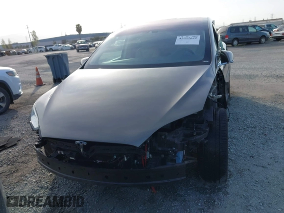 2016 Tesla Model X P90D with VIN 5YJXCAE45GF000773, listed as a IAAI auction lot 42052642 with 127,670 mi miles. Bid and sale history available at carsss.com. Image 13.