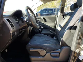 2006 Suzuki Aerio Premium z VIN JS2RC62HX65351200, wystawiony jako Copart lot #88077405 z przebiegiem 165 431 mil mil oraz Szkoda całkowita • Salvage title. Historia ofert i sprzedaży dostępna na DreamBid. Obrazek 7.