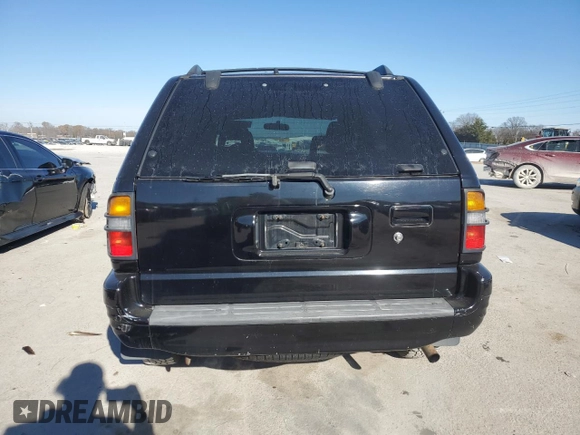 1999 Isuzu Rodeo S with VIN 4S2CK58W2X4336401, listed as a Copart auction lot 83872484 with 191,278 mi miles and Salvage title. Bid and sale history available at DreamBid. Image 6.