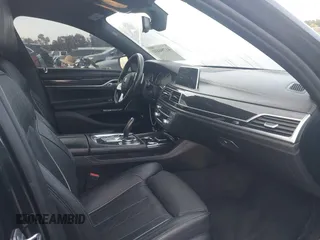 2016 BMW 7 Series 740i with VIN WBA7E2C51GG547537, listed as a IAAI auction lot 41794434 with 149,655 mi miles. Bid and sale history available at carsss.com. Image 5.