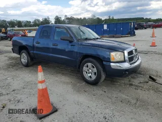 2005 Dodge Dakota SLT with VIN 1D7HE48NX5S308595, listed as a Copart auction lot 56713434 with 257,419 mi miles and Salvage Title. Bid and sale history available at carsss.com. Image 4.