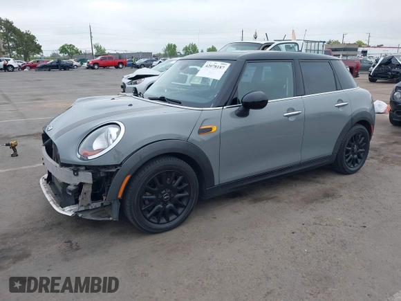 2015 MINI Hardtop 4 Door with VIN WMWXS5C52FT829699, listed as a IAAI auction lot 42078187 with 59,641 mi miles and . Bid and sale history available at DreamBid. Image 18.