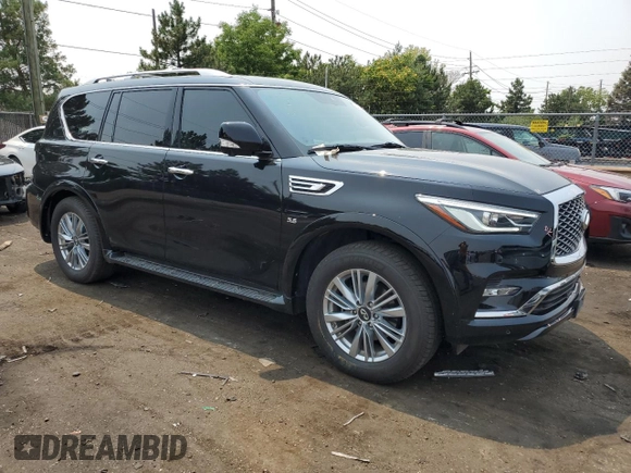2019 Infiniti QX80 LUXE with VIN JN8AZ2NE8K9237560, listed as a Copart auction lot 64019294 with 73,450 mi miles and Salvage Title. Bid and sale history available at carsss.com. Image 4.