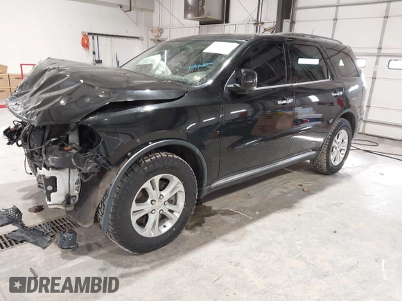 2013 Dodge Durango Crew with VIN 1C4SDJDT9DC670738, listed as a IAAI auction lot 41329419 with 149,520 mi miles and . Bid and sale history available at DreamBid. Image 2.