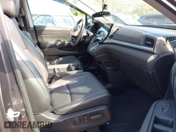 2023 Honda Odyssey EX-L with VIN 5FNRL6H65PB002896, listed as a IAAI auction lot 41559502 with 82,390 mi miles. Bid and sale history available at carsss.com. Image 5.