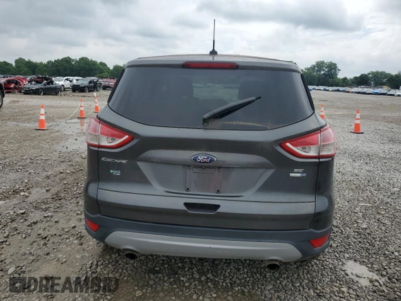 2016 Ford Escape SE z VIN 1FMCU9G97GUB40023, wystawiony jako Copart lot #61405935 z przebiegiem 107 591 mil mil oraz Czysty tytuł • Clean title. Historia ofert i sprzedaży dostępna na DreamBid. Obrazek 6.