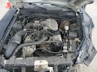 1997 Ford Mustang z VIN 1FALP4049VF169429, wystawiony jako Copart lot #59153175 z przebiegiem 134 454 mil mil oraz Szkoda całkowita • Salvage title. Historia ofert i sprzedaży dostępna na DreamBid. Obrazek 11.