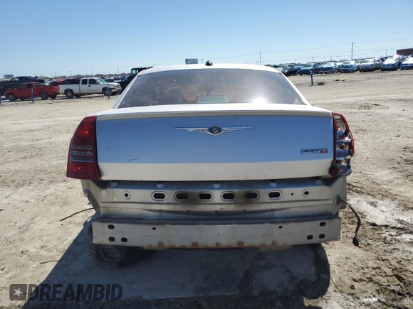 2006 Chrysler 300 C SRT8 with VIN 2C3KA73W76H101950, listed as a Copart auction lot 48501125 with 144,696 mi miles and Salvage Title. Bid and sale history available at carsss.com. Image 6.