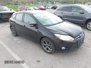 2014 Ford Focus SE with VIN 1FADP3K22EL325404, listed as a IAAI auction lot 42060162 with 115,265 mi miles. Bid and sale history available at carsss.com. Image 1.