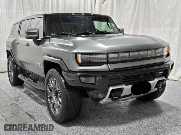 2024 GMC Hummer EV 3X z VIN 1GKB0RDC5RU100378, wystawiony jako Copart lot #88601235 z przebiegiem 7986 mil mil oraz Tytuł czysty. Historia ofert i sprzedaży dostępna na DreamBid. Obrazek 1.
