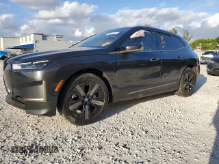2024 BMW iX xDrive50 with VIN WB523CF07RCR88782, listed as a Copart auction lot 46302135 with 6,893 mi miles and Salvage Title. Bid and sale history available at carsss.com. Image 1.