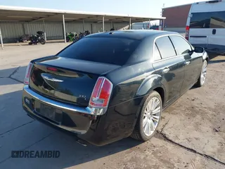 2011 Chrysler 300 with VIN 2C3CA6CT8BH595198, listed as a IAAI auction lot 41983417 with 182,067 mi miles. Bid and sale history available at carsss.com. Image 4.