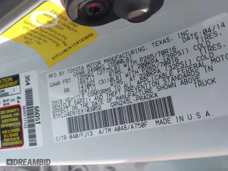 2014 Toyota Tacoma with VIN 5TFLU4EN1EX103052, listed as a IAAI auction lot 41653270 with 121,656 mi miles. Bid and sale history available at carsss.com. Image 9.