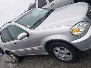 2002 Mercedes-Benz M-Class with VIN 4JGAB54E92A352889, listed as a IAAI auction lot 41805001 with 174,758 mi miles. Bid and sale history available at carsss.com. Image 13.