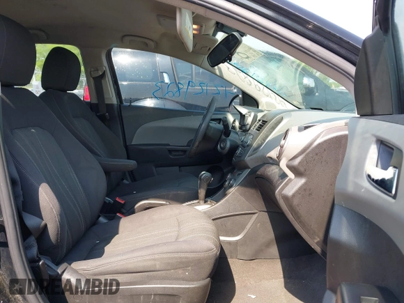 2014 Chevrolet Sonic LT with VIN 1G1JC5SH8E4168554, listed as a IAAI auction lot 42129823 with 276,709 mi miles and . Bid and sale history available at DreamBid. Image 5.