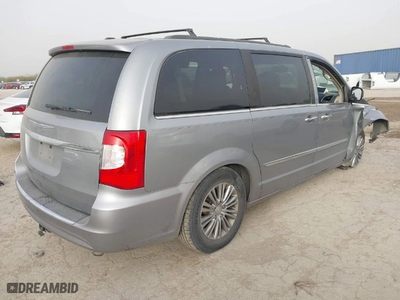 2014 Chrysler Town & Country Touring-L 30th Anniversary with VIN 2C4RC1CGXER454606, listed as a IAAI auction lot 41826042 with 173,300 mi miles. Bid and sale history available at carsss.com. Image 4.