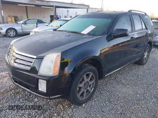 2004 Cadillac SRX with VIN 1GYDE63A040116714, listed as a IAAI auction lot 41828311 with 128,372 mi miles. Bid and sale history available at carsss.com. Image 2.