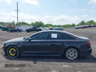 2016 Audi A6 Premium Plus with VIN WAUFGAFC7GN070599, listed as a IAAI auction lot 42460579 with 99,498 mi miles and . Bid and sale history available at DreamBid. Image 14.