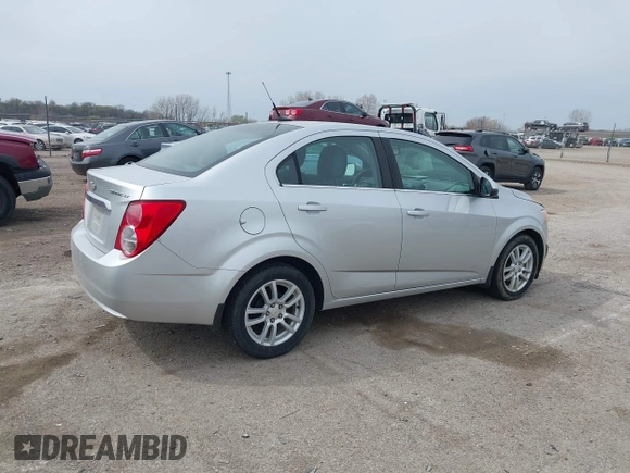 2012 Chevrolet Sonic LT with VIN 1G1JC5SHXC4170853, listed as a IAAI auction lot 41941069 with 130,917 mi miles and . Bid and sale history available at DreamBid. Image 4.