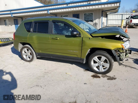 2012 Jeep Compass Latitude with VIN 1C4NJDEB6CD630669, listed as a Copart auction lot 52028235 with 124,123 mi miles and Salvage Title. Bid and sale history available at DreamBid. Image 4.