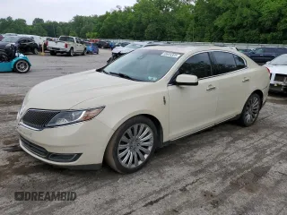 2014 Lincoln MKS z VIN 1LNHL9DK5EG603806, wystawiony jako Copart lot #59934325 z przebiegiem 219 968 mil mil oraz Czysty tytuł • Clean title. Historia ofert i sprzedaży dostępna na DreamBid. Obrazek 1.