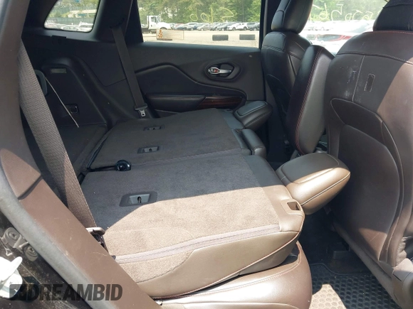 2014 Jeep Cherokee Trailhawk with VIN 1C4PJMBS8EW285276, listed as a IAAI auction lot 42408796 with Not provided miles and . Bid and sale history available at DreamBid. Image 8.