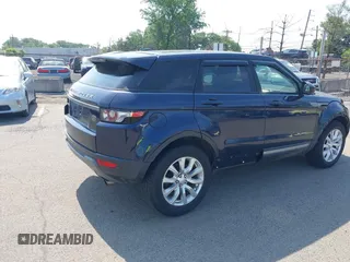 2015 Land Rover Range Rover Evoque Pure z VIN SALVN2BG5FH972645, wystawiony jako IAAI lot #42482661 z przebiegiem 156 726 mil mil oraz . Historia ofert i sprzedaży dostępna na DreamBid. Obrazek 4.