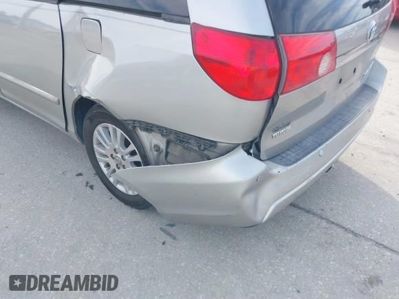 2008 Toyota Sienna XLE with VIN 5TDZK22C18S161339, listed as a IAAI auction lot 41449450 with 202,512 mi miles. Bid and sale history available at carsss.com. Image 6.