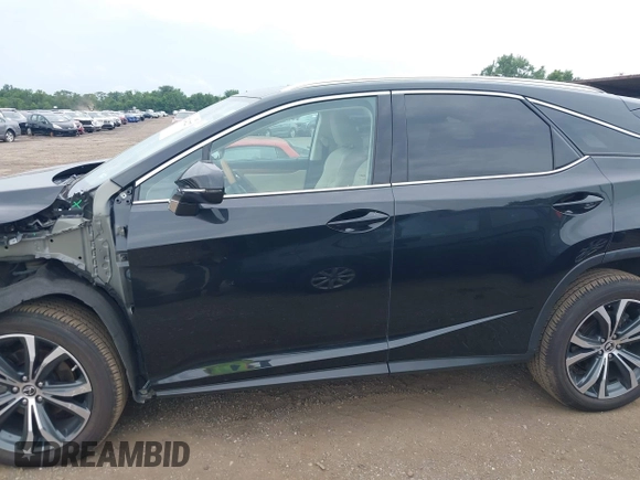 2022 Lexus RX 350 with VIN 2T2HZMDAXNC316100, listed as a IAAI auction lot 42744222 with 38,809 mi miles and . Bid and sale history available at DreamBid. Image 14.