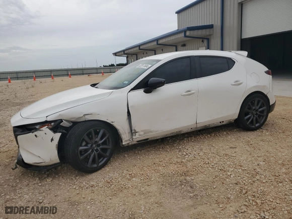 2020 Mazda Mazda3 Hatchback Preferred Package with VIN JM1BPBMM7L1158847, listed as a Copart auction lot 62917684 with 87,289 mi miles and Salvage Title. Bid and sale history available at carsss.com. Image 1.