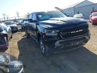 2022 Ram 1500 Laramie with VIN 1C6SRFRT7NN180979, listed as a IAAI auction lot 41824340 with 32,446 mi miles and . Bid and sale history available at DreamBid. Image 1.