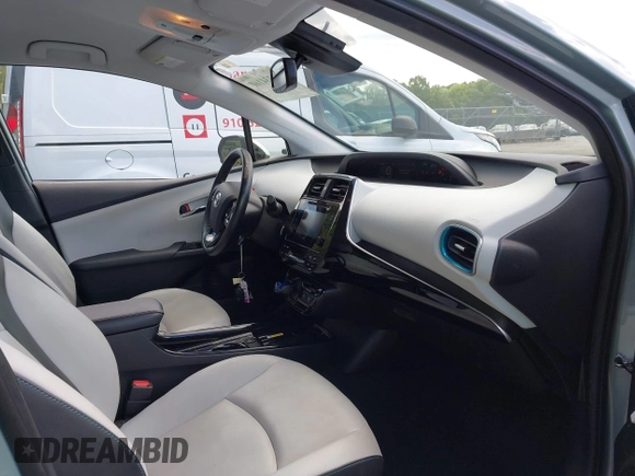 2019 Toyota Prius L Eco z VIN JTDKARFU8K3095669, wystawiony jako IAAI lot #42334160 z przebiegiem 59 882 mil mil oraz . Historia ofert i sprzedaży dostępna na DreamBid. Obrazek 5.