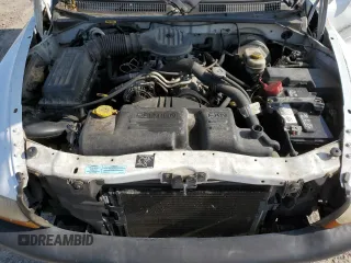 2001 Dodge Dakota z VIN 1B7GL22X21S128774, wystawiony jako Copart lot #58313685 z przebiegiem 167 355 mil mil oraz Czysty tytuł • Clean title. Historia ofert i sprzedaży dostępna na DreamBid. Obrazek 11.