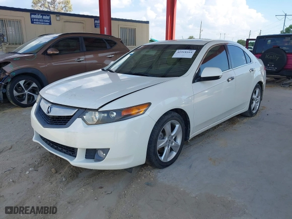 2009 Acura TSX with VIN JH4CU266X9C012935, listed as a IAAI auction lot 41918164 with 158,220 mi miles. Bid and sale history available at carsss.com. Image 2.