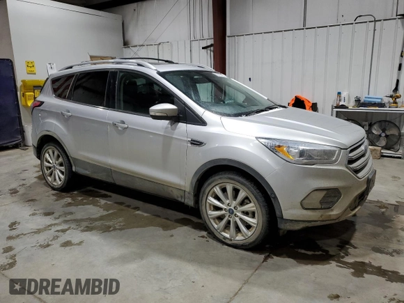 2018 Ford Escape Titanium with VIN 1FMCU9J95JUC62170, listed as a Copart auction lot 86991454 with 93,486 mi miles and Salvage title. Bid and sale history available at DreamBid. Image 4.