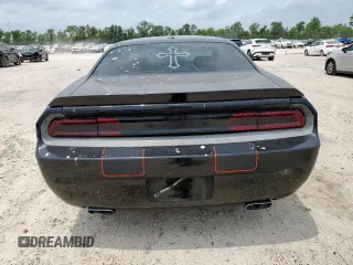 2013 Dodge Challenger R/T z VIN 2C3CDYBT3DH670283, wystawiony jako Copart lot #57818395 z przebiegiem 93 439 mil mil oraz Czysty tytuł • Clean title. Historia ofert i sprzedaży dostępna na DreamBid. Obrazek 6.