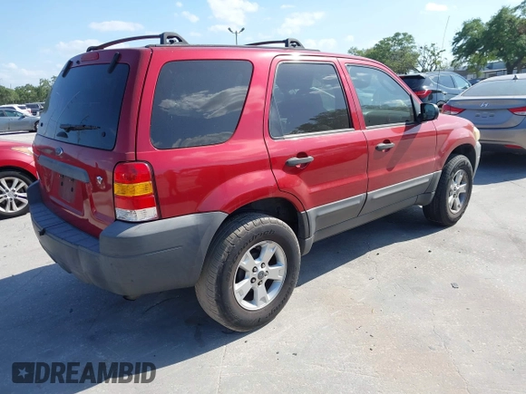 2007 Ford Escape XLT with VIN 1FMYU03197KA34105, listed as a IAAI auction lot 41888661 with 174,717 mi miles and . Bid and sale history available at DreamBid. Image 4.