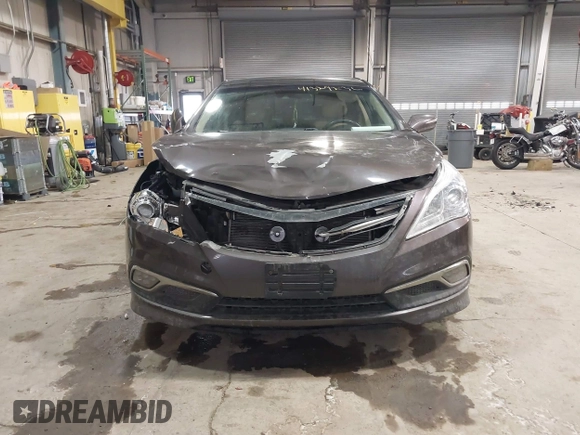 2015 Hyundai Azera Limited z VIN KMHFH4JG2FA432545, wystawiony jako IAAI lot #41329236 z przebiegiem 98 661 mil mil oraz . Historia ofert i sprzedaży dostępna na DreamBid. Obrazek 12.