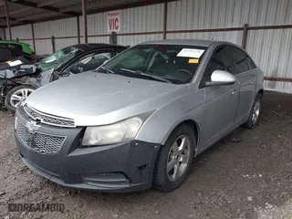 2012 Chevrolet Cruze LT w/1LT with VIN 1G1PF5SCXC7368675, listed as a IAAI auction lot 41197276 with 212,559 mi miles. Bid and sale history available at carsss.com. Image 2.