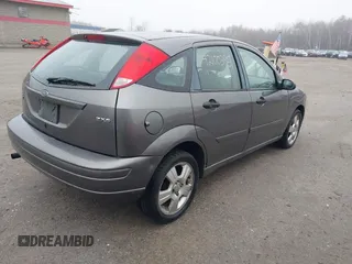 2006 Ford Focus S with VIN 1FAFP37N26W180795, listed as a IAAI auction lot 42100395 with 125,002 mi miles and . Bid and sale history available at carsss.com. Image 4.