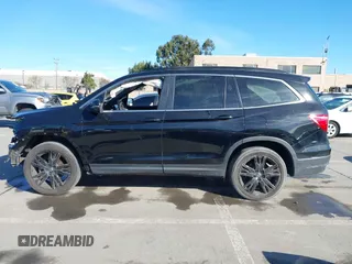 2022 Honda Pilot Special Edition with VIN 5FNYF6H26NB102339, listed as a IAAI auction lot 41194432 with 54,121 mi miles. Bid and sale history available at carsss.com. Image 15.