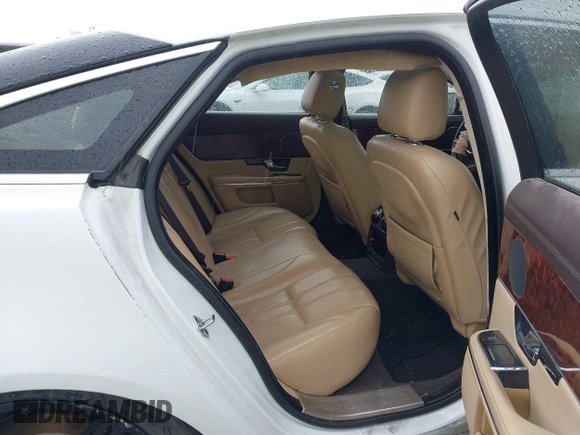 2012 Jaguar XJ with VIN SAJWA1CB7CLV35339, listed as a IAAI auction lot 41945850 with 123,501 mi miles and . Bid and sale history available at DreamBid. Image 8.